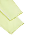 Close-up of the ankle hem on the TrackLine Outline Leggings in Light Green