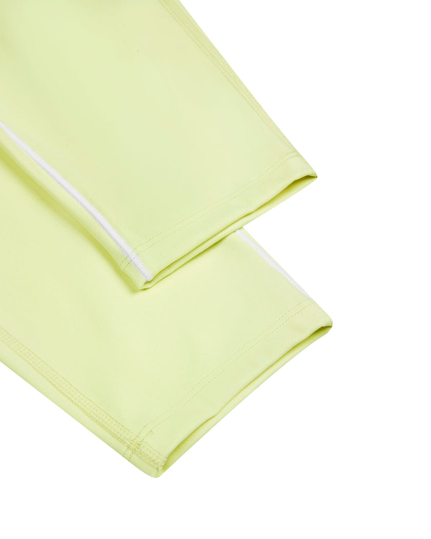 Close-up of the ankle hem on the TrackLine Outline Leggings in Light Green