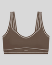 TrackLine Outline Sports Bra in Coffee front view featuring contrast piping and a supportive fit