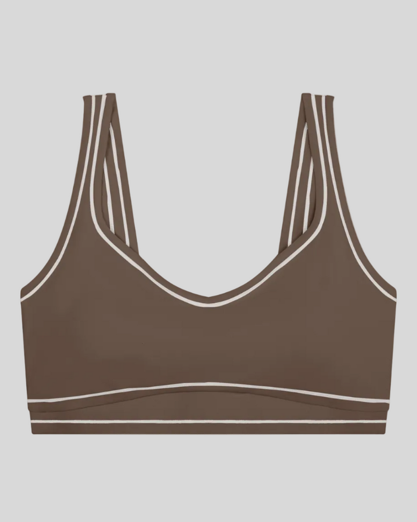 TrackLine Outline Sports Bra in Coffee front view featuring contrast piping and a supportive fit