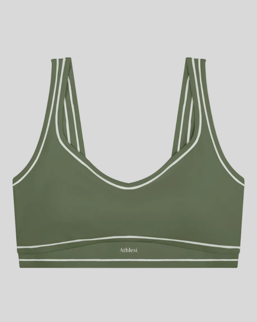 TrackLine Outline Sports Bra in Gray Green front view featuring contrast piping and a supportive fit