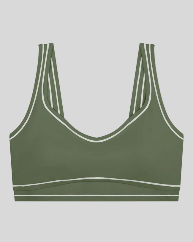 TrackLine Outline Sports Bra in Gray Green front view featuring contrast piping and a supportive fit