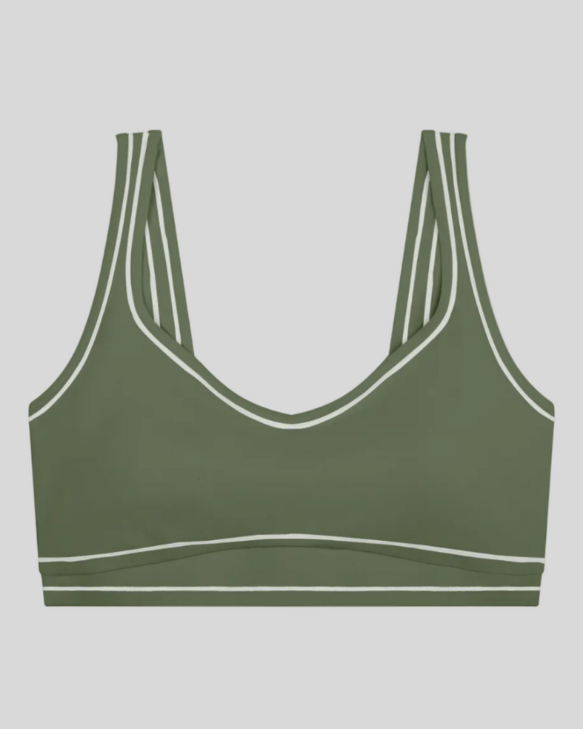 TrackLine Outline Sports Bra in Gray Green front view featuring contrast piping and a supportive fit