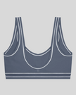 TrackLine Outline Sports Bra in Haze Blue back view showcasing the open scoop back design