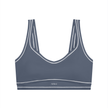 TrackLine Outline Sports Bra in Haze Blue front view featuring contrast piping and a supportive fit