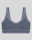 TrackLine Outline Sports Bra in Haze Blue front view featuring contrast piping and a supportive fit