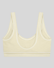 TrackLine Outline Sports Bra in Light Apricot back view showcasing the open scoop back design