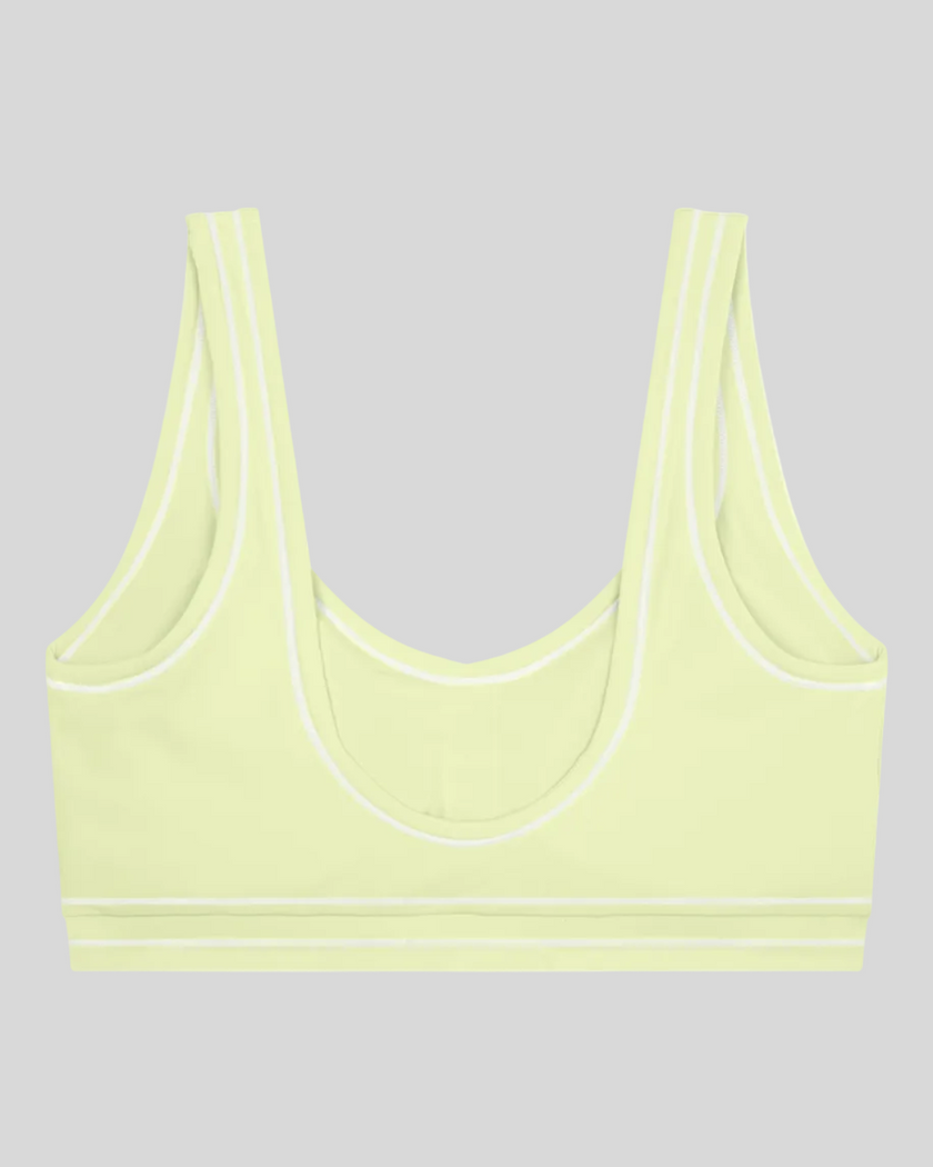 TrackLine Outline Sports Bra in Light Green back view showcasing the open scoop back design