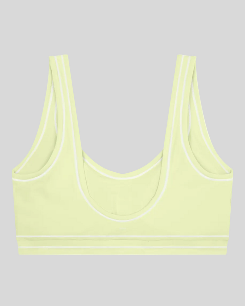 TrackLine Outline Sports Bra in Light Green back view showcasing the open scoop back design
