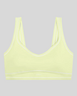 TrackLine Outline Sports Bra in Light Green front view featuring contrast piping and a supportive fit