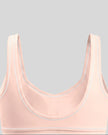 Close-up of the scoop back and contrast piping on the TrackLine Outline Sports Bra in Light Pink
