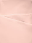 Close-up of the smooth stretch performance fabric used on the TrackLine Outline Sports Bra in Light Pink