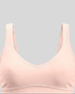 Close-up of the front neckline and contrast piping on the TrackLine Outline Sports Bra in Light Pink