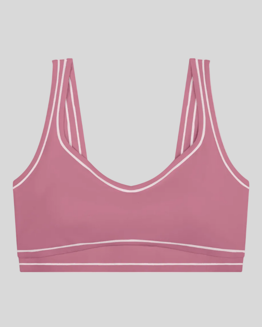 TrackLine Outline Sports Bra in Purple front view featuring contrast piping and a supportive fit