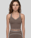 Model wearing the TrackLine Outline Tank Top in Coffee viewed from the front