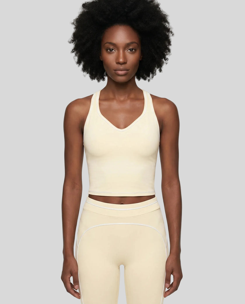 Model wearing the TrackLine Outline Tank Top in Light Apricot viewed from the front