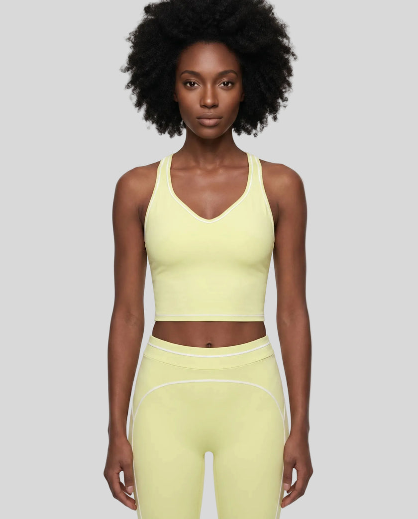Model wearing the TrackLine Outline Tank Top in Light Green viewed from the front