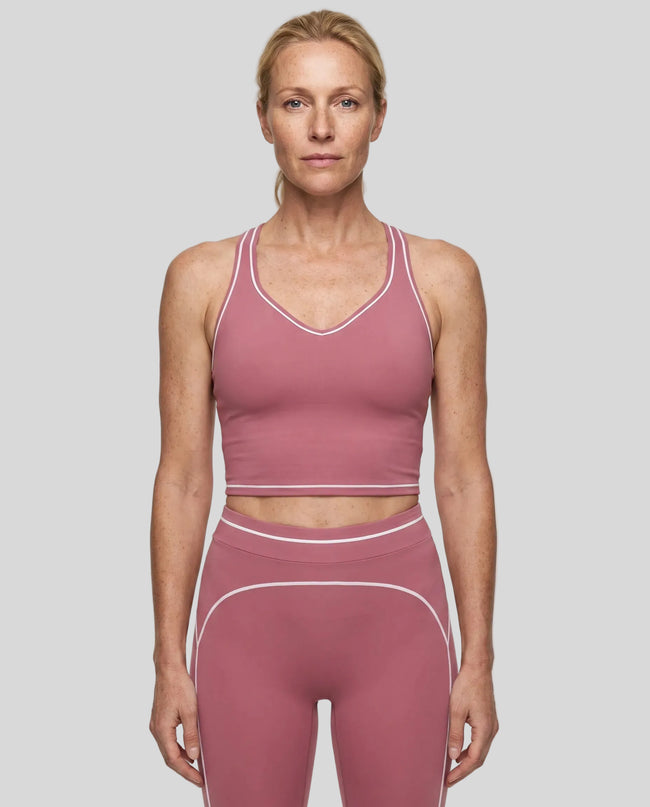 Model wearing the TrackLine Outline Tank Top in Purple viewed from the front