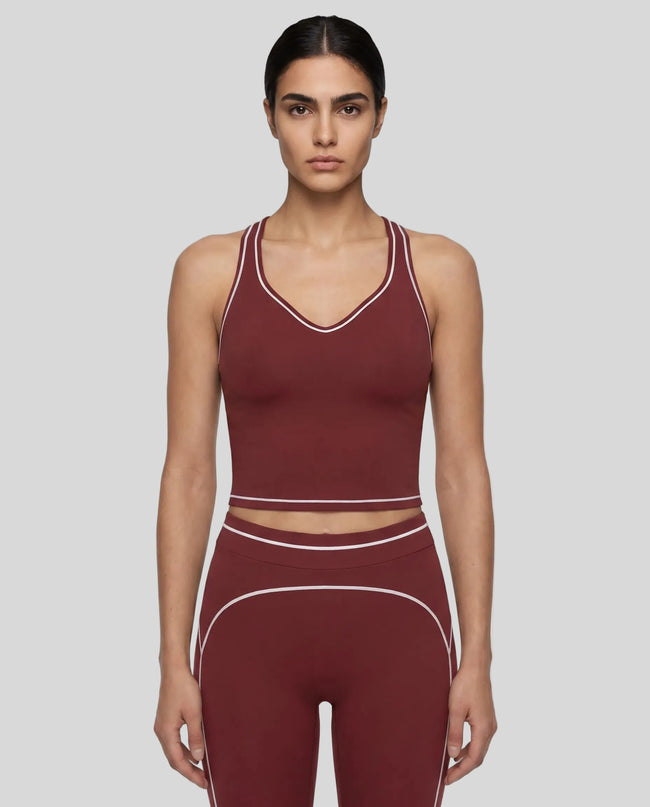 Model wearing the TrackLine Outline Tank Top in Red viewed from the front