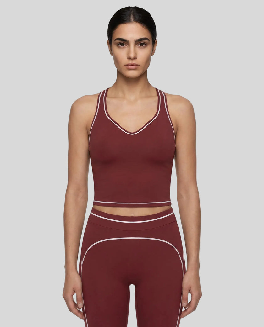 Model wearing the TrackLine Outline Tank Top in Red viewed from the front