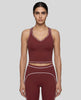 Model wearing the TrackLine Outline Tank Top in Red viewed from the front