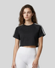 Upper body front view of a woman wearing the Athlesi TrackLine Performance Crop Tee in black