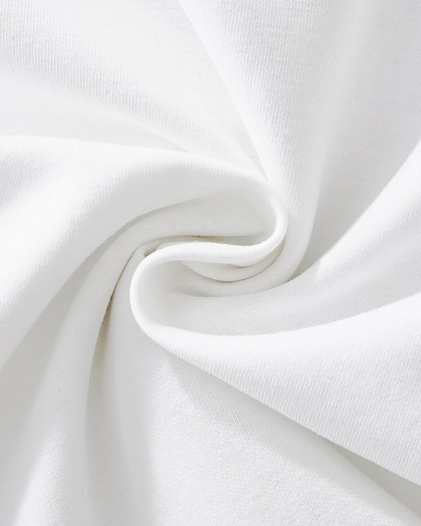 Detailed fabric texture closeup of the Athlesi TrackLine Performance Crop Tee in white