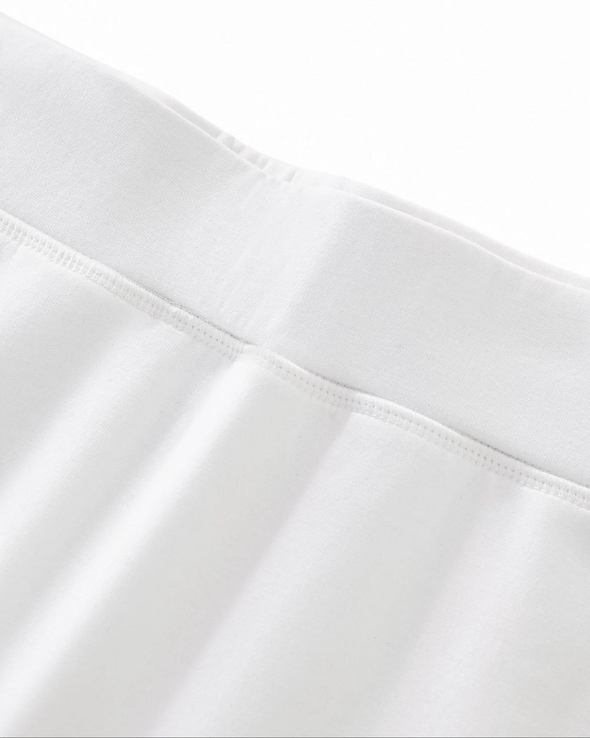 Front waistband closeup of the Athlesi TrackLine Performance Skort in white
