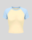 TrackLine Raglan Baby Tee in Apricot with Sky Blue front view with contrast short sleeves and crew neckline