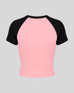 TrackLine Raglan Baby Tee in Pink with Black back view with contrast raglan sleeves and fitted silhouette