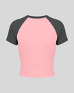 TrackLine Raglan Baby Tee in Pink with Dark Gray back view with contrast raglan sleeves and fitted silhouette
