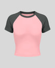 TrackLine Raglan Baby Tee in Pink with Dark Gray front view with contrast short sleeves and crew neckline