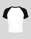 TrackLine Raglan Baby Tee in White with Black back view with contrast raglan sleeves and fitted silhouette