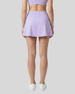 Back view of the TrackLine Rally A-Line Slit Skirt in lavender on model
