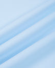 Closeup of the smooth stretch performance fabric used in the TrackLine Rally A-Line Slit Skirt