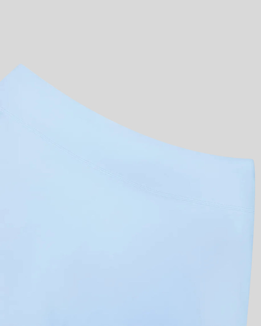 Closeup of the back waistband on the TrackLine Rally A-Line Slit Skirt in sky blue