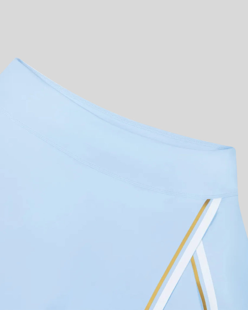 Closeup of the front waistband on the TrackLine Rally A-Line Slit Skirt in sky blue