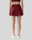 Back view of the TrackLine Rally A-Line Slit Skirt in wine red on model
