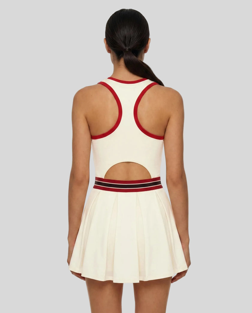 Model wearing the TrackLine Rally Dress in Beige side view