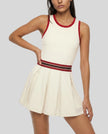 Model wearing the TrackLine Rally Dress in Beige angled front view