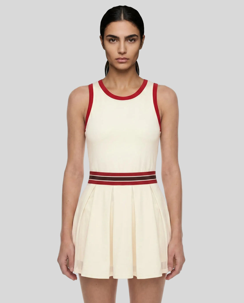 Model wearing the TrackLine Rally Dress in Beige front view