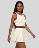 Model wearing the TrackLine Rally Dress in Beige angled front view