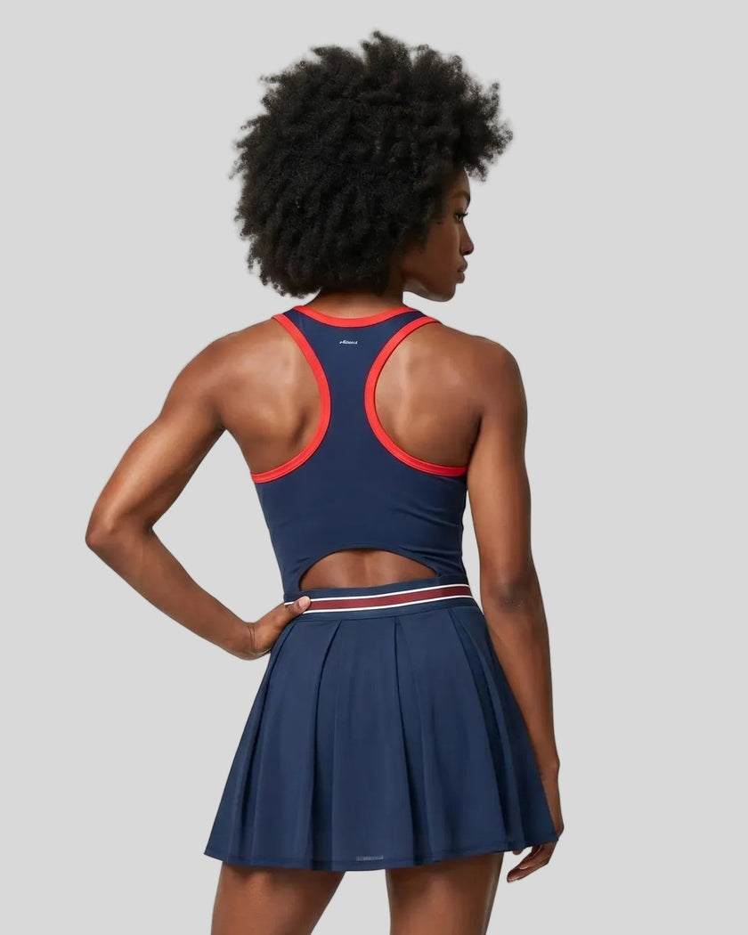 Model wearing the TrackLine Rally Dress in Navy Blue back view