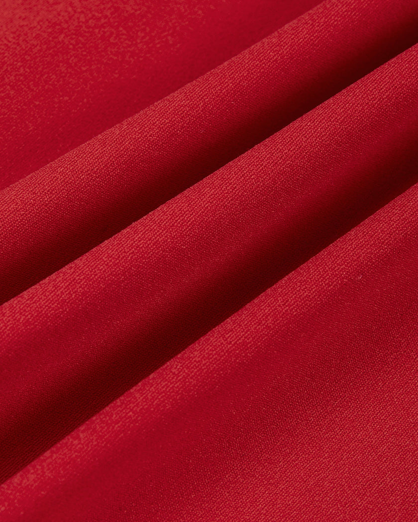 Stretch performance fabric detail of the TrackLine Rally Dress