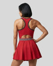 Model wearing the TrackLine Rally Dress in Red angled back view