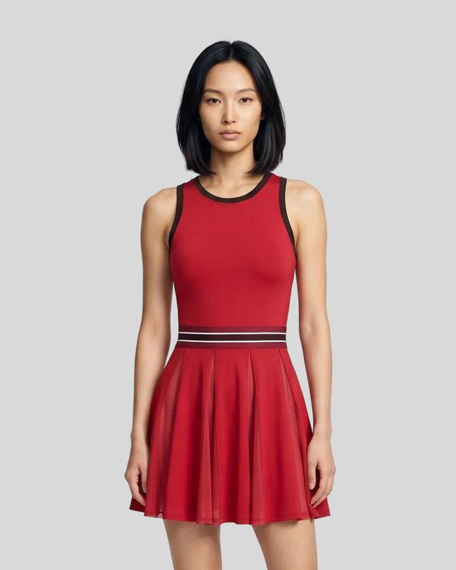 Model wearing the TrackLine Rally Dress in Beige front view