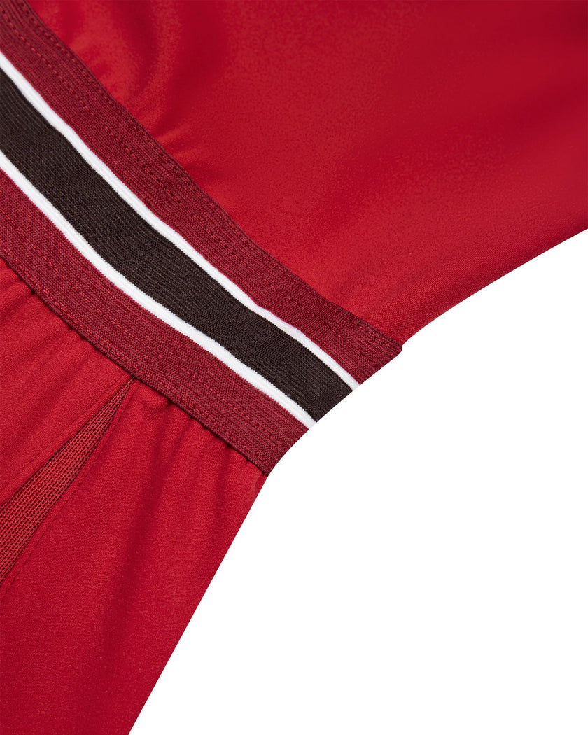 Striped waistband detail of the TrackLine Rally Dress