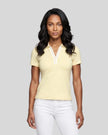 Model wearing the light yellow Athlesi TrackLine Rally Polo Shirt with white contrast neckline, front view