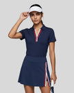 Model wearing the navy blue Athlesi TrackLine Rally Polo Shirt with red and white contrast neckline, front view
