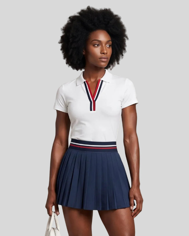 Model wearing the white Athlesi TrackLine Rally Polo Shirt with red and navy blue contrast neckline, front view